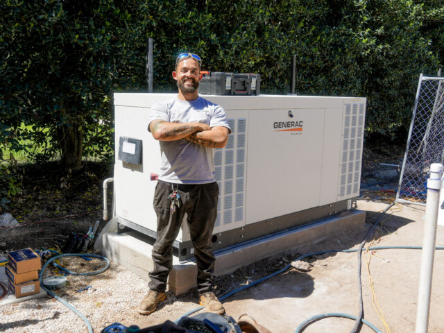 An In Charge electrician installing a liquid cooled generator at a home in Central Texas.
