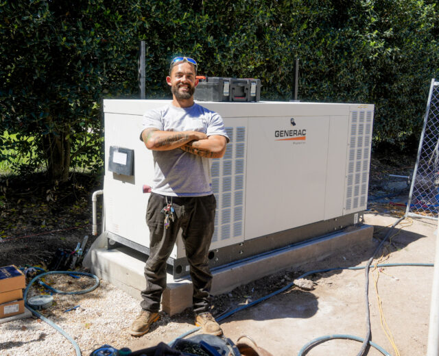 An In Charge electrician installing a liquid cooled generator at a home in Central Texas.