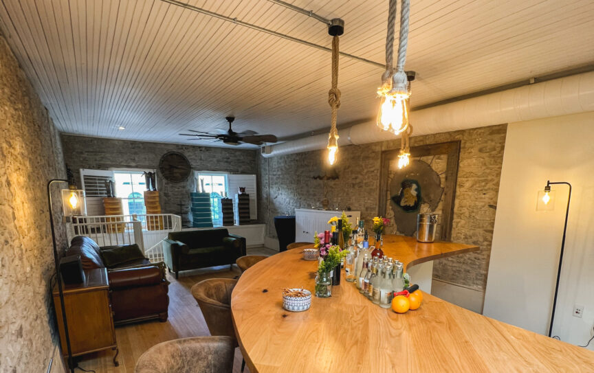 Lighting on the second story of a historic small town building that has been converted into a living space.